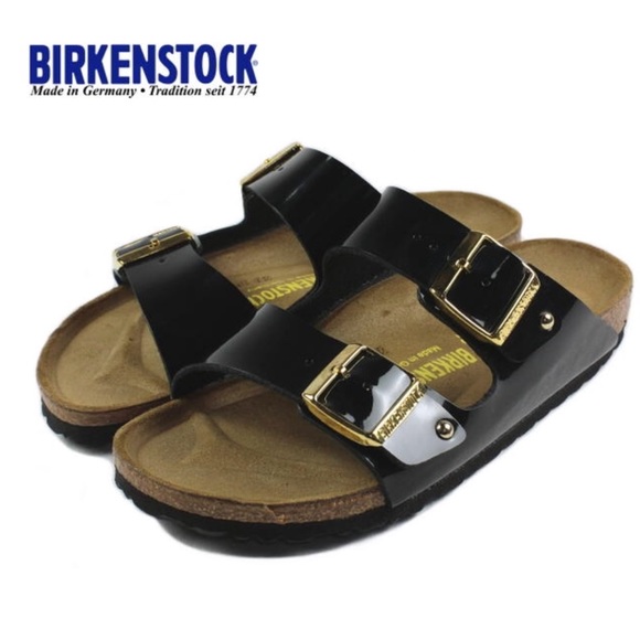 black patent birkenstocks with gold buckle